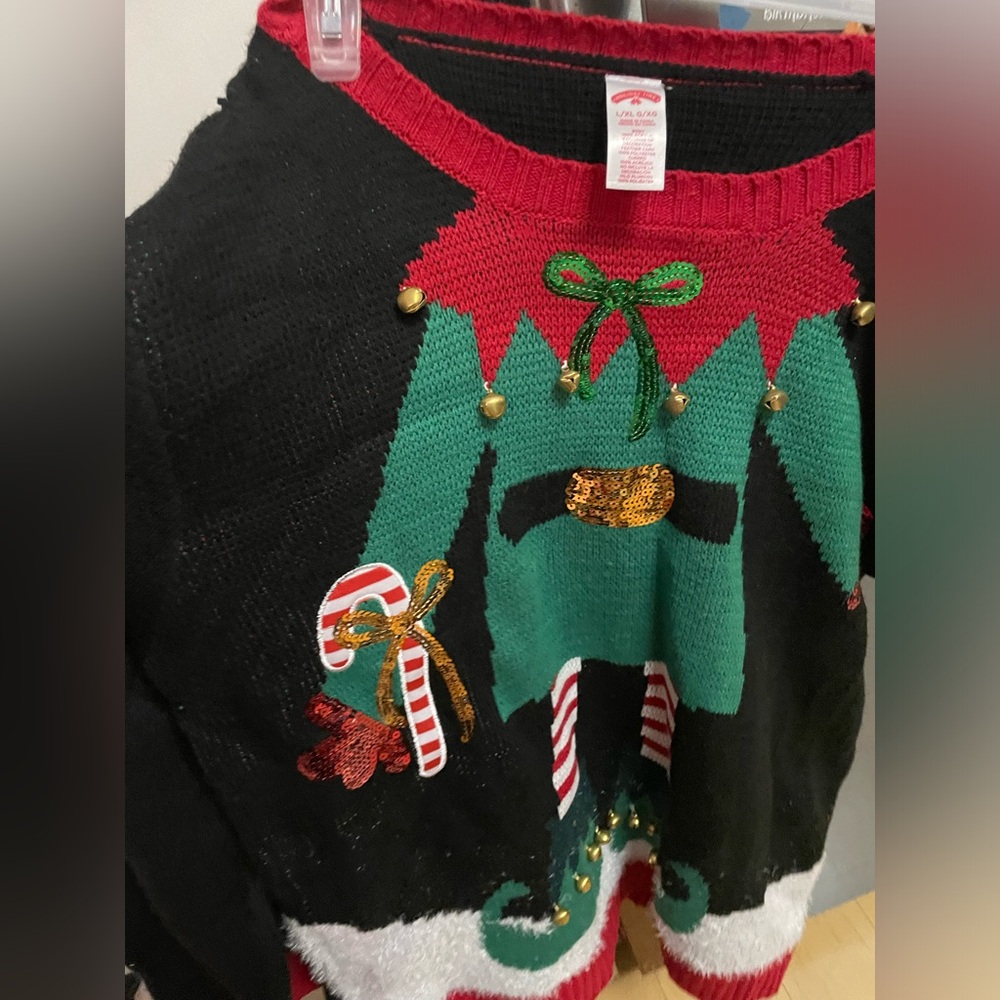 Couple ugly Christmas sweaters
